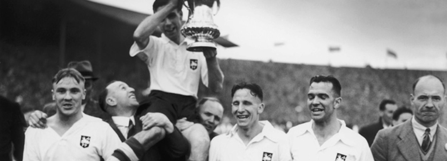 Preston North End celebrating their victory in the 1938 FA Cup Final at Wembley Stadium